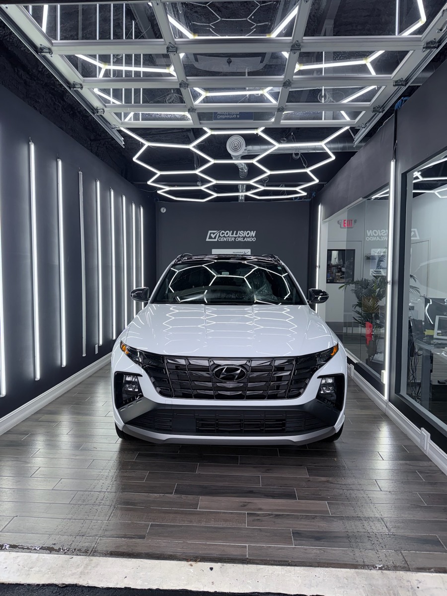 White Hyundai SUV restored and ready for delivery after auto body repair in Orlando White Hyundai SUV restored and ready for delivery after auto body repair in Orlando