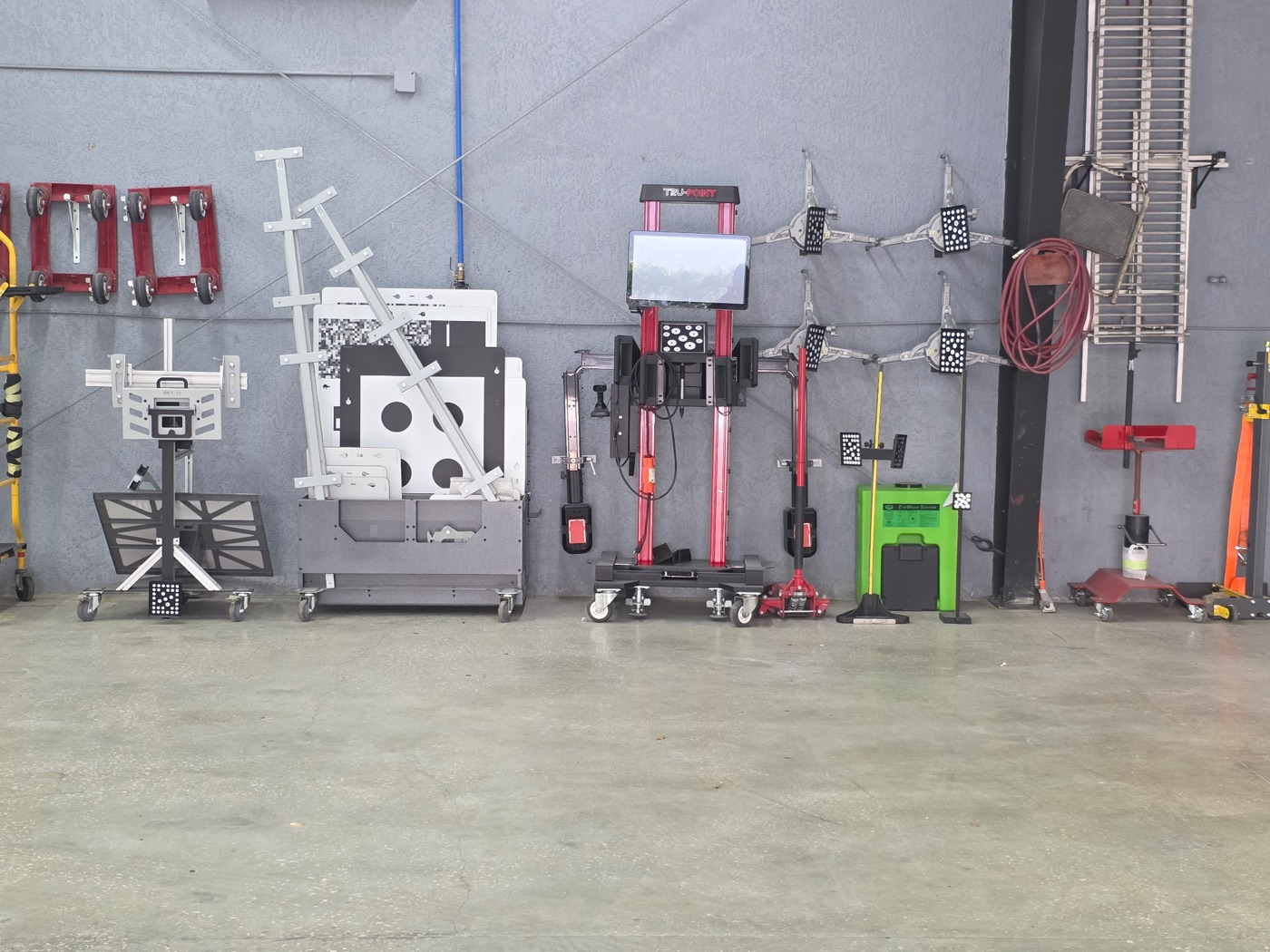 ADAS calibration station at Collision Center Orlando — a TRU-POINT system and calibration targets used to recalibrate cameras and sensors after collision repair ADAS calibration station at Collision Center Orlando — a TRU-POINT system and calibration targets used to recalibrate cameras and sensors after collision repair